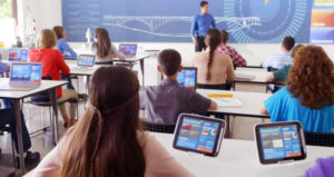 Students in classroom with personal devices